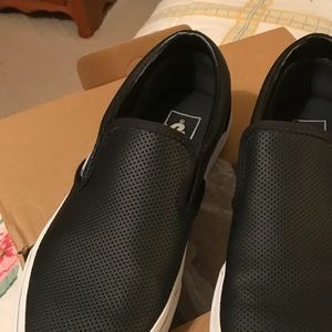 Black slip on Vans